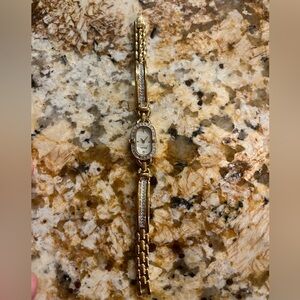 Little Bulova gold watch